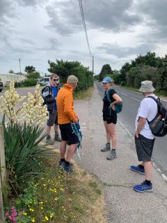 Awaiting the bus outside the Winchelsea Sands Holiday Park